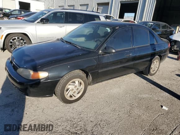 ✅ 1999 Ford Escort LX • VIN: 1FAFP10P5XW277376 • Lot: 82148204. Listed on Copart with 127,634 mi. Free auction sales archive from the USA and detailed vehicle history report at DreamBid. Image 1.