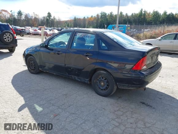 ✅ 2003 Ford Focus LX • VIN: 1FAFP33P53W180521 • Lot: 43639979. Wystawiony na IAAI z przebiegiem 102 163 mil. Bezpłatny archiwum sprzedaży aukcyjnych z USA i szczegółowy raport historii pojazdu na DreamBid. Zdjęcie 3.