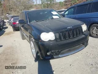 ✅ 2006 Jeep Grand Cherokee SRT-8 • VIN: 1J8HR78326C300185 • Lot: 43664503. Wystawiony na IAAI z przebiegiem 155 517 mil. Bezpłatny archiwum sprzedaży aukcyjnych z USA i szczegółowy raport historii pojazdu na DreamBid. Zdjęcie 1.