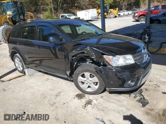 2012 Dodge Journey SXT с VIN 3C4PDCBG4CT289938, выставлен на аукционе Copart как лот 82733135 с пробегом 157 760 миль миль и Списание • Salvage title. История ставок и продаж доступна на DreamBid. Изображение 4.