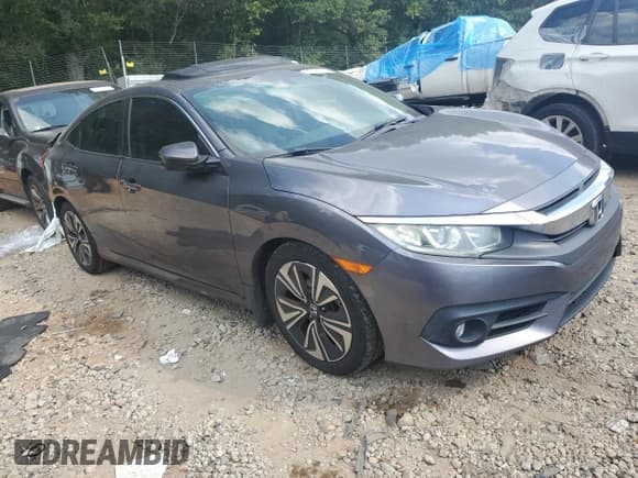 ✅ 2016 Honda Civic EX-L • VIN: 19XFC1F75GE028602 • Lot: 70491775. Listed on Copart with 154,743 mi. Free auction sales archive from the USA and detailed vehicle history report at DreamBid. Image 4.