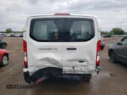 ✅ 2020 Ford Transit Cargo • VIN: 1FTYE1Y87LKA06133 • Lot: 70294424. Wystawiony na Copart z przebiegiem 81 602 mil. Bezpłatny archiwum sprzedaży aukcyjnych z USA i szczegółowy raport historii pojazdu na DreamBid. Zdjęcie 6.