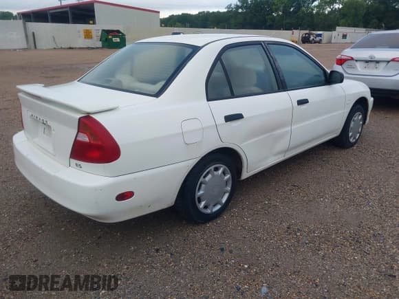 ✅ 2001 Mitsubishi Mirage ES • VIN: JA3AY26C91U025367 • Lot: 42234058. Listed on IAAI with 177,709 mi. Free auction sales archive from the USA and detailed vehicle history report at DreamBid. Image 4.