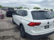✅ 2023 Volkswagen Tiguan SE • VIN: 3VVMB7AX0PM036876 • Lot: 42023415. Listed on IAAI with 42,003 mi. Free auction sales archive from the USA and detailed vehicle history report at DreamBid. Image 3.