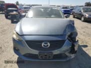 ✅ 2014 Mazda 6 i Sport • VIN: JM1GJ1U58E1106964 • Lot: 80411495. Wystawiony na Copart z przebiegiem 185 240 mil. Bezpłatny archiwum sprzedaży aukcyjnych z USA i szczegółowy raport historii pojazdu na DreamBid. Zdjęcie 5.