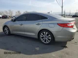2013 Hyundai Azera z VIN KMHFG4JG7DA230882, wystawiony jako Copart lot #43561825 z przebiegiem 177 154 mil mil oraz Szkoda całkowita • Salvage title. Historia ofert i sprzedaży dostępna na DreamBid. Obrazek 2.