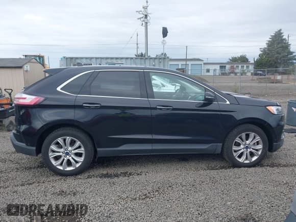 ✅ 2020 Ford Edge Titanium • VIN: 2FMPK4K93LBA71980 • Lot: 43335741. Wystawiony na IAAI z przebiegiem 78 807 mil. Bezpłatny archiwum sprzedaży aukcyjnych z USA i szczegółowy raport historii pojazdu na DreamBid. Zdjęcie 14.