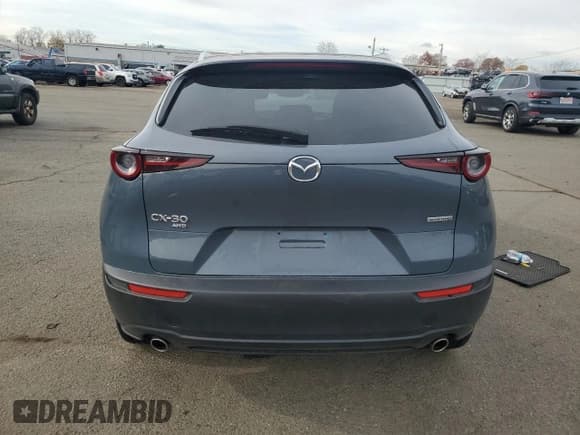 ✅ 2023 Mazda CX-30 S Carbon Edition • VIN: 3MVDMBCM7PM576612 • Лот: 91021795. Опубликован ранее на Copart с пробегом 19 796 миль. Бесплатный доступ к архиву аукционных продаж из США и подробный отчёт об истории автомобиля на DreamBid. Изображение 6.