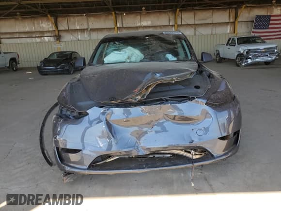 ✅ 2023 Tesla Model Y Performance • VIN: 7SAYGDEF0PA049584 • Lot: 69508355. Wystawiony na Copart z przebiegiem 38 412 mil. Bezpłatny archiwum sprzedaży aukcyjnych z USA i szczegółowy raport historii pojazdu na DreamBid. Zdjęcie 5.