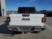 ✅ 2021 Jeep Gladiator Willys • VIN: 1C6HJTAG6ML565992 • Лот: 91303275. Опубликован ранее на Copart с пробегом 27 904 миль. Бесплатный доступ к архиву аукционных продаж из США и подробный отчёт об истории автомобиля на DreamBid. Изображение 6.