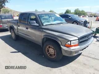 2002 Dodge Dakota SLT z VIN 1B7HL48N32S587531, wystawiony jako IAAI lot #42266638 z przebiegiem 151 397 mil mil oraz . Historia ofert i sprzedaży dostępna na DreamBid. Obrazek 1.