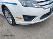 ✅ 2011 Ford Fusion Hybrid • VIN: 3FADP0L34BR202769 • Lot: 42504494. Listed on IAAI with 33,902 mi. Free auction sales archive from the USA and detailed vehicle history report at DreamBid. Image 6.