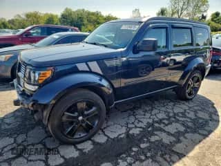 2011 Dodge Nitro Shock z VIN 1D4PT7GX1BW576300, wystawiony jako Copart lot #71124675 z przebiegiem 86 382 mil mil oraz Szkoda całkowita • Salvage title. Historia ofert i sprzedaży dostępna na DreamBid. Obrazek 1.