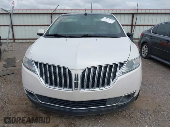 ✅ 2015 Lincoln MKX • VIN: 2LMDJ6JKXFBL29300 • Lot: 42121970. Listed on IAAI with 182,302 mi. Free auction sales archive from the USA and detailed vehicle history report at DreamBid. Image 13.