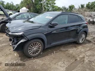 ✅ 2018 Hyundai Kona SEL • VIN: KM8K62AA9JU097151 • Лот: 64304364. Опубликован ранее на Copart с пробегом 85 498 миль. Бесплатный доступ к архиву аукционных продаж из США и подробный отчёт об истории автомобиля на DreamBid. Изображение 1.
