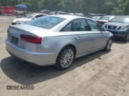 ✅ 2016 Audi A6 Prestige • VIN: WAUHGAFC1GN095006 • Lot: 42607718. Wystawiony na IAAI z przebiegiem 128 147 mil. Bezpłatny archiwum sprzedaży aukcyjnych z USA i szczegółowy raport historii pojazdu na DreamBid. Zdjęcie 4.