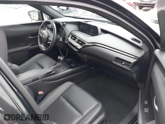 ✅ 2021 Lexus UX 250h • VIN: JTHX9JBHXM2049972 • Lot: 40956792. Listed on IAAI with 47,882 mi. Free auction sales archive from the USA and detailed vehicle history report at DreamBid. Image 5.