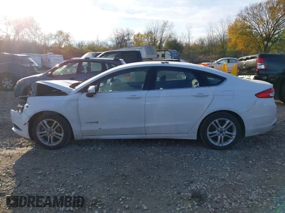 ✅ 2018 Ford Fusion SE • VIN: 3FA6P0LU4JR169997 • Lot: 43556652. Listed on IAAI with 119,771 mi. Free auction sales archive from the USA and detailed vehicle history report at DreamBid. Image 14.