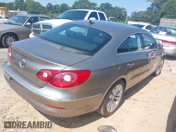 ✅ 2012 Volkswagen CC Sport • VIN: WVWMN7AN2CE534422 • Лот: 43012819. Опубликован ранее на IAAI с пробегом 100 843 миль. Бесплатный доступ к архиву аукционных продаж из США и подробный отчёт об истории автомобиля на DreamBid. Изображение 4.