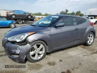 2013 Hyundai Veloster w/Black Int с VIN KMHTC6AD9DU095127, выставлен на аукционе Copart как лот 70422785 с пробегом 188 309 миль миль и Списание • Salvage title. История ставок и продаж доступна на DreamBid. Изображение 1.