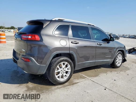 ✅ 2015 Jeep Cherokee Latitude • VIN: 1C4PJLCS5FW516841 • Lot: 84189215. Listed on Copart with 164,493 mi. Free auction sales archive from the USA and detailed vehicle history report at DreamBid. Image 3.