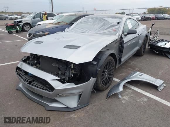 ✅ 2021 Ford Mustang GT Premium • VIN: 1FA6P8CFXM5111061 • Lot: 43574919. Listed on IAAI with 22,551 mi. Free auction sales archive from the USA and detailed vehicle history report at DreamBid. Image 2.