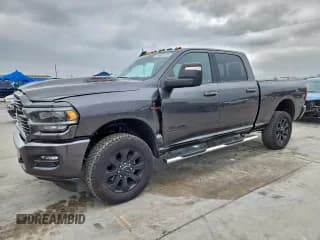 ✅ 2024 Ram 2500 Laramie • VIN: 3C6UR5FL9RG104279 • Lot: 95867875. Listed on Copart with 50,665 mi. Free auction sales archive from the USA and detailed vehicle history report at DreamBid. Image 1.