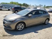 ✅ 2017 Chevrolet Cruze LT • VIN: 3G1BE6SM6HS572751 • Lot: 47690933. Listed on Copart with 65,685 mi. Free auction sales archive from the USA and detailed vehicle history report at DreamBid. Image 1.