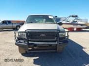 ✅ 2004 Ford Excursion Limited • VIN: 1FMNU43SX4EB57487 • Lot: 43455706. Listed on IAAI with 310,247 mi. Free auction sales archive from the USA and detailed vehicle history report at DreamBid. Image 12.
