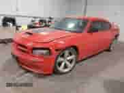 2009 Dodge Charger SRT-8 с VIN 2B3LA73W59H598180, выставлен на аукционе IAAI как лот 41392102 с пробегом Не указан миль и . История ставок и продаж доступна на DreamBid. Изображение 2.