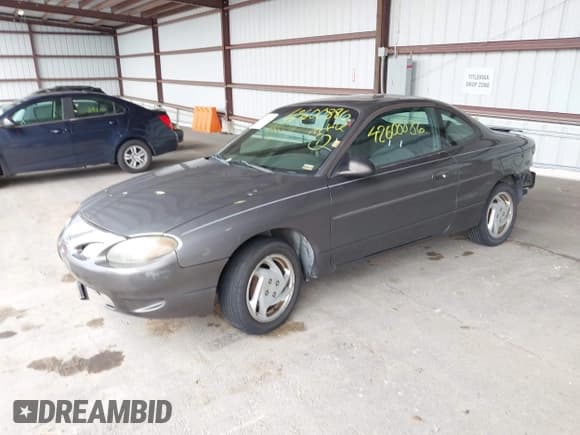 ✅ 2002 Ford Escort ZX2 Standard • VIN: 3FAFP11342R224496 • Lot: 42600886. Wystawiony na IAAI z przebiegiem 164 189 mil. Bezpłatny archiwum sprzedaży aukcyjnych z USA i szczegółowy raport historii pojazdu na DreamBid. Zdjęcie 2.