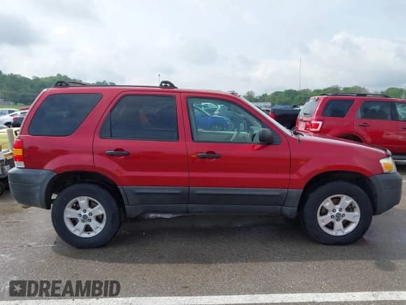 ✅ 2006 Ford Escape XLT • VIN: 1FMYU93166KA44836 • Lot: 42104051. Listed on IAAI with 176,367 mi. Free auction sales archive from the USA and detailed vehicle history report at DreamBid. Image 13.