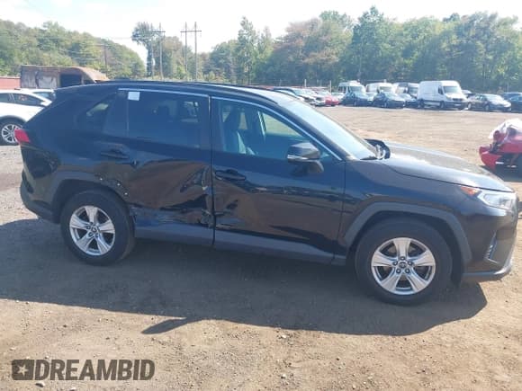 ✅ 2019 Toyota RAV4 XLE • VIN: 2T3W1RFV3KW012477 • Лот: 43271739. Опубликован ранее на IAAI с пробегом 188 136 миль. Бесплатный доступ к архиву аукционных продаж из США и подробный отчёт об истории автомобиля на DreamBid. Изображение 17.