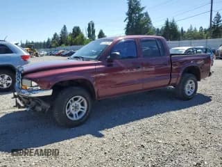 ✅ 2003 Dodge Dakota • VIN: 1D7HG48X43S167144 • Lot: 62705325. Wystawiony na Copart z przebiegiem 228 732 mil. Bezpłatny archiwum sprzedaży aukcyjnych z USA i szczegółowy raport historii pojazdu na DreamBid. Zdjęcie 1.
