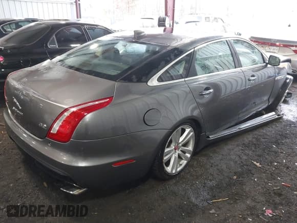 ✅ 2016 Jaguar XJ Portfolio • VIN: SAJWJ2GD7G8W02919 • Lot: 41490211. Listed on IAAI with 170,768 mi. Free auction sales archive from the USA and detailed vehicle history report at DreamBid. Image 4.
