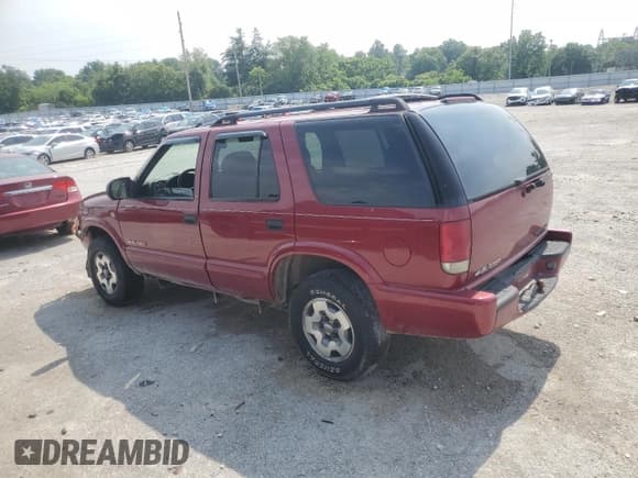 ✅ 2002 Chevrolet Blazer LS • VIN: 1GNDT13W02K145942 • Lot: 60195245. Wystawiony na Copart z przebiegiem 141 567 mil. Bezpłatny archiwum sprzedaży aukcyjnych z USA i szczegółowy raport historii pojazdu na DreamBid. Zdjęcie 2.