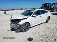 ✅ 2017 Honda Civic Touring • VIN: 19XFC1F92HE008228 • Lot: 91644875. Listed on Copart with 96,339 mi. Free auction sales archive from the USA and detailed vehicle history report at DreamBid. Image 1.