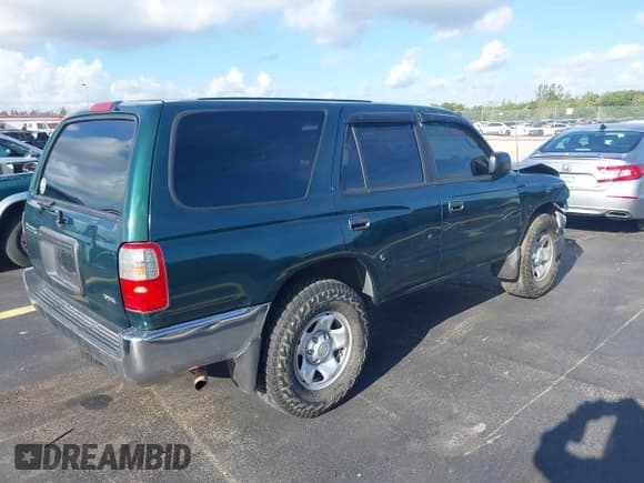 ✅ 1999 Toyota 4Runner • VIN: JT3GM84R5X0050322 • Lot: 42499061. Listed on IAAI with 243,606 mi. Free auction sales archive from the USA and detailed vehicle history report at DreamBid. Image 4.