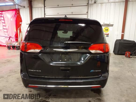 ✅ 2020 Chrysler Pacifica Hybrid Limited • VIN: 2C4RC1N75LR105539 • Лот: 42693774. Опубликован ранее на IAAI с пробегом 97 310 миль. Бесплатный доступ к архиву аукционных продаж из США и подробный отчёт об истории автомобиля на DreamBid. Изображение 17.