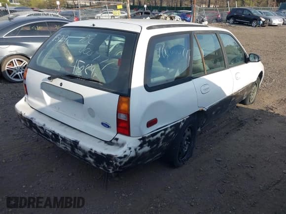 ✅ 1997 Ford Escort LX • VIN: 3FALP15P1VR124828 • Lot: 42128530. Listed on IAAI with Not provided. Free auction sales archive from the USA and detailed vehicle history report at DreamBid. Image 4.