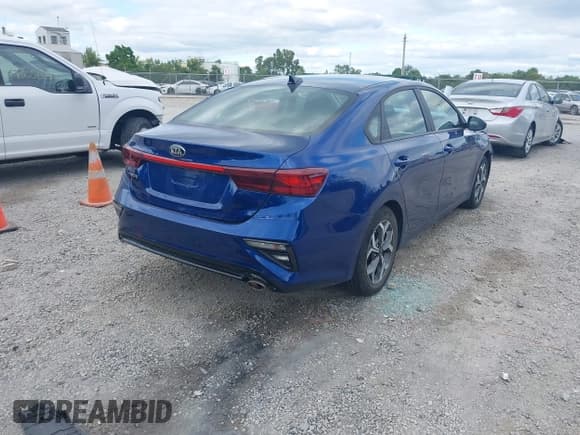 ✅ 2021 Kia Forte LXS • VIN: 3KPF24AD3ME412827 • Lot: 43068337. Listed on IAAI with 31,775 mi. Free auction sales archive from the USA and detailed vehicle history report at DreamBid. Image 4.