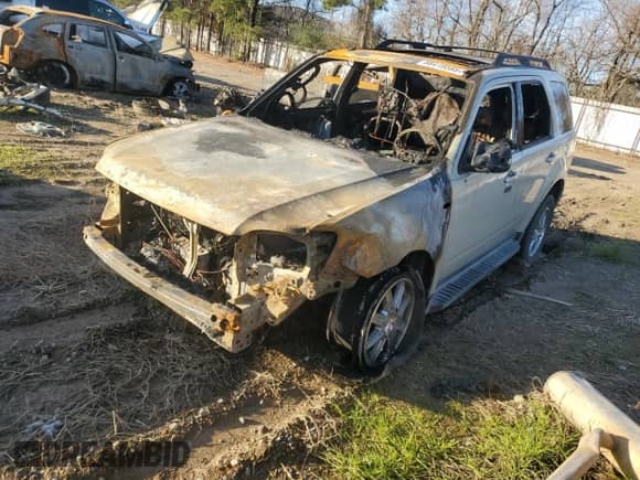 2009 Mercury Mariner с VIN 4M2CU81G09KJ14863, выставлен на аукционе Copart как лот 88419595 с пробегом Не указан миль и Списание • Salvage title. История ставок и продаж доступна на DreamBid. Изображение 1.