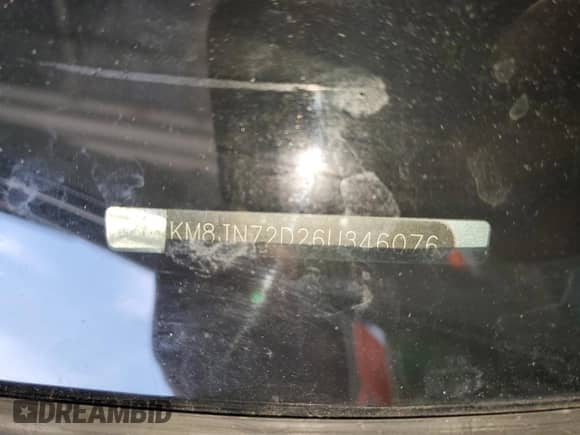 2006 Hyundai Tucson GLS with VIN KM8JN72D26U346076, listed as a Copart auction lot 77447474 with 123,993 mi miles and Salvage title. Bid and sale history available at DreamBid. Image 13.