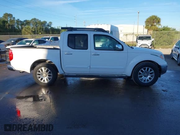 ✅ 2010 Nissan Frontier SE • VIN: 1N6AD0ER9AC438013 • Lot: 41852387. Wystawiony na IAAI z przebiegiem 200 220 mil. Bezpłatny archiwum sprzedaży aukcyjnych z USA i szczegółowy raport historii pojazdu na DreamBid. Zdjęcie 13.