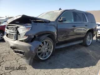 2017 Chevrolet Tahoe LS with VIN 1GNSCAKC8HR163636, listed as a Copart auction lot 72037135 with 140,754 mi miles and Clean title. Bid and sale history available at DreamBid. Image 1.