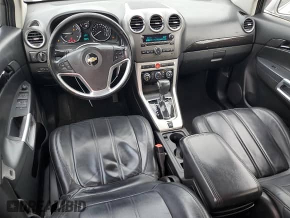 2014 Chevrolet Captiva Sport LTZ z VIN 3GNAL4EK4ES558048, wystawiony jako Copart lot #81246634 z przebiegiem 118 879 mil mil oraz Szkoda całkowita • Salvage title. Historia ofert i sprzedaży dostępna na DreamBid. Obrazek 8.