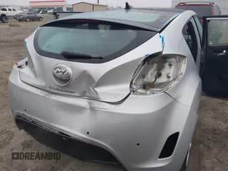 ✅ 2012 Hyundai Veloster w/Gray Int • VIN: KMHTC6AD1CU072228 • Lot: 41197169. Wystawiony na IAAI z przebiegiem 214 994 mil. Bezpłatny archiwum sprzedaży aukcyjnych z USA i szczegółowy raport historii pojazdu na DreamBid. Zdjęcie 6.