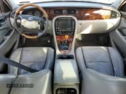 ✅ 2008 Jaguar XJ 8 LWB • VIN: SAJWA79B58SH21567 • Лот: 91188825. Опубликован ранее на Copart с пробегом 125 331 миль. Бесплатный доступ к архиву аукционных продаж из США и подробный отчёт об истории автомобиля на DreamBid. Изображение 8.