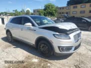 ✅ 2019 Lincoln Nautilus Reserve • VIN: 2LMPJ6LP1KBL50990 • Lot: 69210645. Listed on Copart with 65,309 mi. Free auction sales archive from the USA and detailed vehicle history report at DreamBid. Image 4.