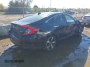 ✅ 2017 Honda Civic Touring • VIN: 19XFC1F99HE025978 • Lot: 43544695. Listed on IAAI with 123,323 mi. Free auction sales archive from the USA and detailed vehicle history report at DreamBid. Image 4.